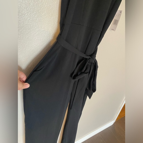 Moa Moa brand Black High Neck Flutter Sleeve Tie Waist Jumpsuit Size Large NWT - Picture 3 of 8